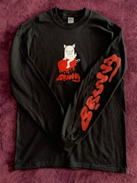 a black long - sleeve t - shirt with a cat on it